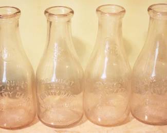 95 - Lot of 4 W.L. Neal Danville, VA Milk Bottles 9.5" tall
