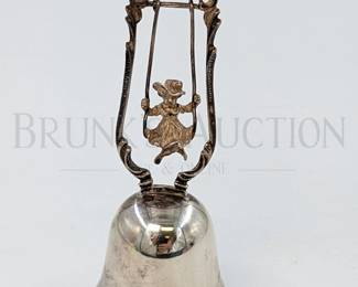 35.77 GRAMS TW 835 SILVER BELL W/ SWINGING GIRL STAMPED AT THE...