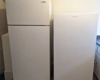upright freezer and Frigidaire refrigerator with top freezer