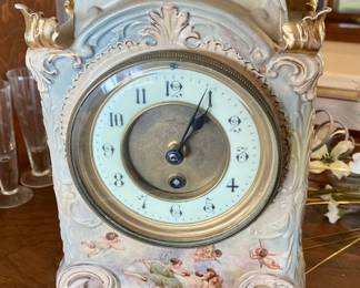 Very Nice Porcelain Antique/Victorian Royal Bonn shelf clock. Will likely need a cleaning service.