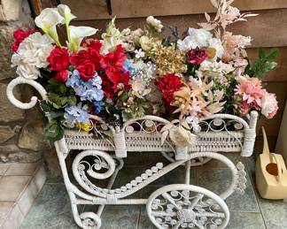 Vintage White Wicker tea cart on wheels with lot of Floral decor sold separately.