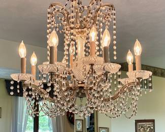 Elegant Rotating Chandelier. Will have to get fair price to remove.