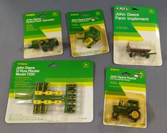 Ertl Diecast John Deere 1:64 Scale Tractor With Sound-Gard Body #5509, Hydra-Push Spreader #574, 12 Row Planter Model 7200 #576, Round Baler, And Hay Cart