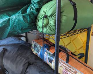 large and small tents, sleeping bag, camping gear