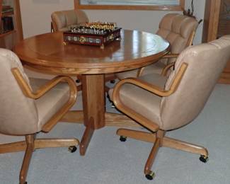 GAME TABLE WITH LEATHER CHAIRS ON WHEELS - ROUND OAK TABLE