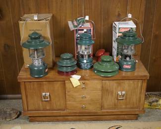 Total of 5 Coleman lanterns and additional hats