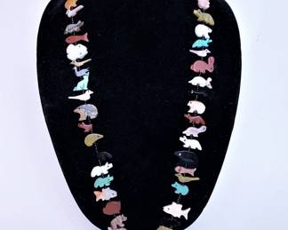 Navajo necklace by Running Bear .......To register and to place bids simply go to www.capitolsalesservices.hibid.com 