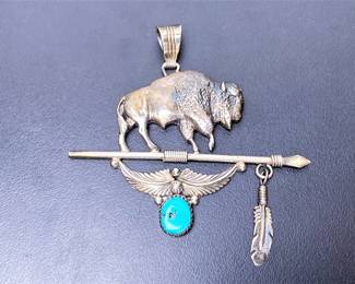Navajo sterling pendant by Running Bear