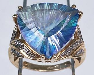 14k gold ring with trillion cut blue topaz by John C Rinker