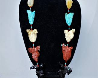 Native American necklace of double sided hand carved stone figures 
