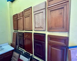 Cabinet doors and drawer fronts in various styles and stains.