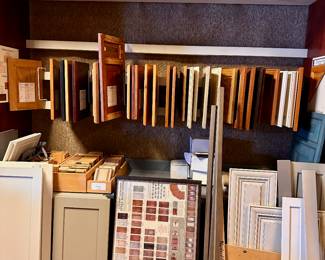 Cabinet doors and drawer fronts in various styles and stains.