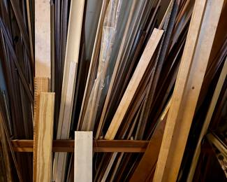 Stacks of moulding and picture framing.