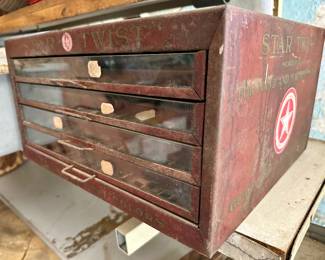 Antique Star Twist sewing thread spool cabinet.  ca 1920's.  Front and side view.