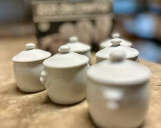 Covered pudding cups.