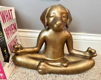 meditating dog statue