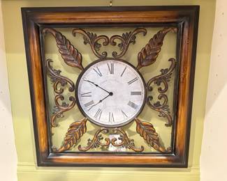 wall clock in wood frame