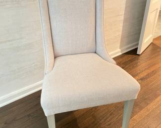 Set of 4 of Simply Done Design & Interiors Custom-Designed Dining Chairs Upholstered in Neutral Elitis Fabric. Each Chair Measures 24" W x 38" H with 18" Seat Height. Photo 1 of 2. 
