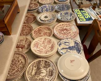 table full of red and white plus blue and white transfer ware