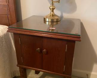 nightstand next to Victorian bed