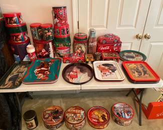 lots of COKE trays and tins