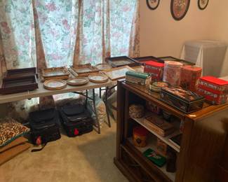 table of needlepoint items