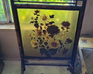 Glass fireplace screen..rattan. circa 1900