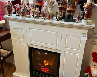 Electric fireplace with mantle. Can be used with or without heat.