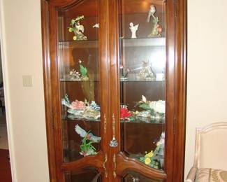 Curio with Boehm porcelains