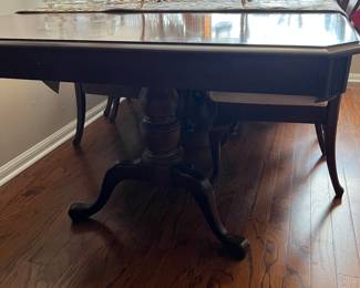 Dining room table with three leaves . 