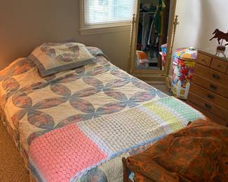 Bed and neat mirror.