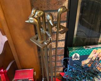 Amazing brass duck fireplace tender set.