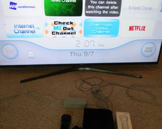 Nintendo Wii console with Super Mario Bros.