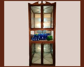 Tall Corner Display Cabinet with Mirrored Sides and Glass Shelves