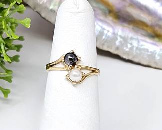 Small Ring (Size 4) 14k Yellow Gold Featuring Two Cultured Pearls, One White one Black each 4.2 mm