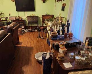 Taxidermy, antique desks (2), antique sewing machine (in table) other furniture items.