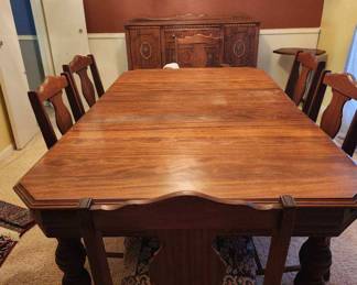 Antique dining set with six chairs
