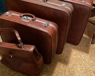 Antique Ventura luggage set.