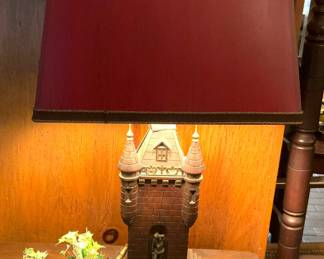 "Castle" lamp with red shade