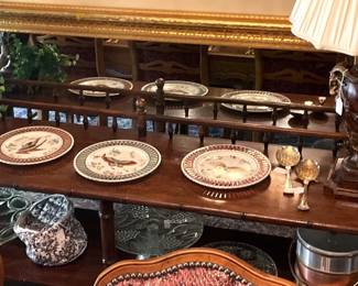 Large gold mirror(setting in back); bamboo style sofa table; plates; one of two matching lamps