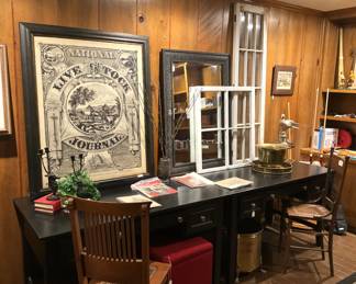 Two black desks (side by side); antique chairs; mirror; door and window frames