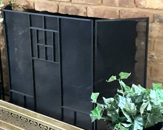 Black fireplace screen; brass fire fender