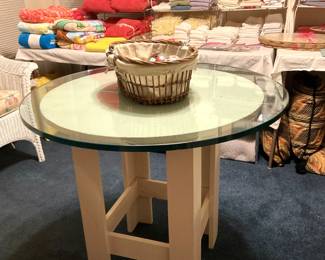 Sturdy table - great for custom cloth (Put glass on top.)