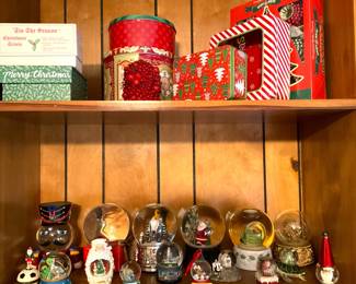Tins and snow globes