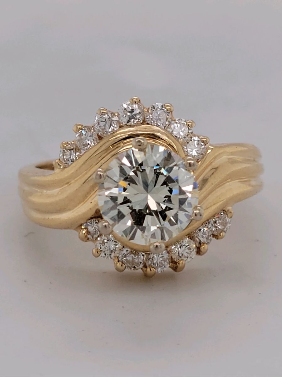 2 Carat Center Round Brilliant Cut Diamond (clarity SI1 color J)- 2.56 Carat total Diamonds set in 14k Yellow Gold (ring size 8.5)