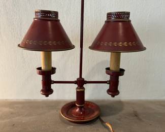 Red tole lamp 
Item Location
Living Room 