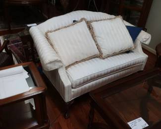 off  white  loveseat              it  is  58"