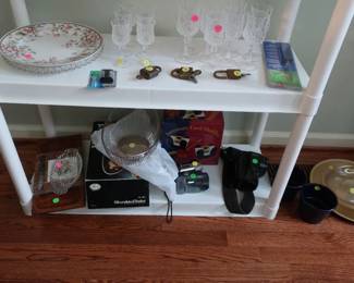 camera  items  and  glassware , plus  decor