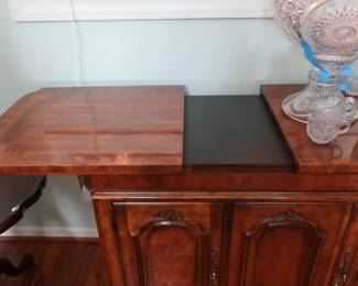 view  of dining  room  server  with  one  size  extended