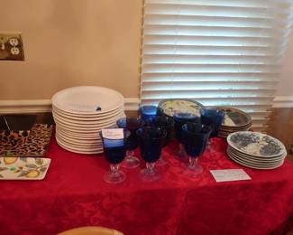 blue  stemware, asian  plates  (are  sold), other  wall  decor  plates
